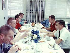 Rice's Curt Michel, third from left, dines on the traditional steak-and-egg breakfast with Neil Armstrong and others on the day Armstrong and David Scott blasted into orbit on Gemini 8. From lower left: Deke Slayton, the Manned Spacecraft Center's assistant director for flight crew operations; Armstrong; Michel; astronaut Walter Cunningham; astronaut office chief Alan Shepard; Scott; and astronaut Roger Chaffee.