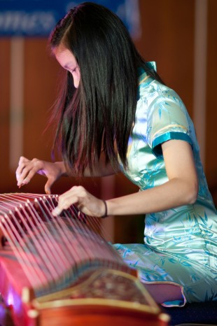 girl playing music