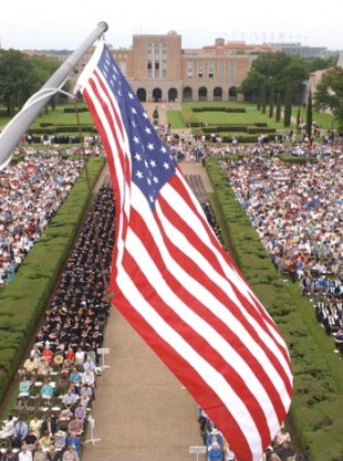 U.S. flag flying over Academic Quad at commencement