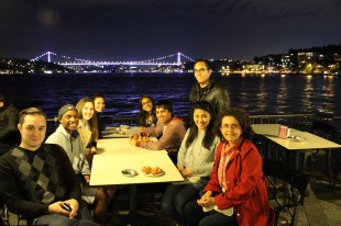 Rice Gateway students with staff members Ipek Martinez and Alex Wyatt enjoying dinner near the Bosphorus River.