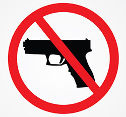 No symbol over photo of gun