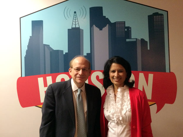 Rice President David Leebron and University of Houston President Renu Khator stand in front of the "Houston Matters" logo