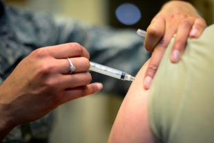 flu shot being administered