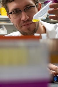 Rice University graduate student Josh Atkinson is lead author of a new paper describing a technique to use proteins as electrical switches in biological systems. (Credit: Jeff Fitlow/Rice University) 