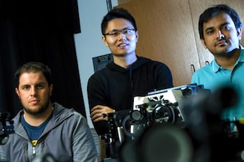 Rice University researchers, from left, Nicholas Moringo, Fan Ye and Chayan Dutta are co-authors of a new paper that advances super temporal resolution microscopy, a technique the lab has advanced with the ability to make custom phase masks. Photo by Jeff Fitlow