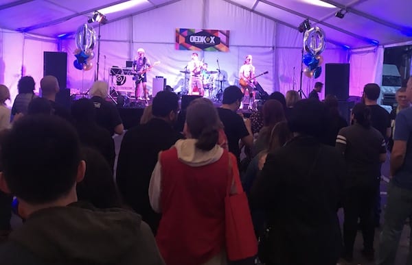 A crowd grooves to the Spazmatics in the large tent outside the OEDK. 