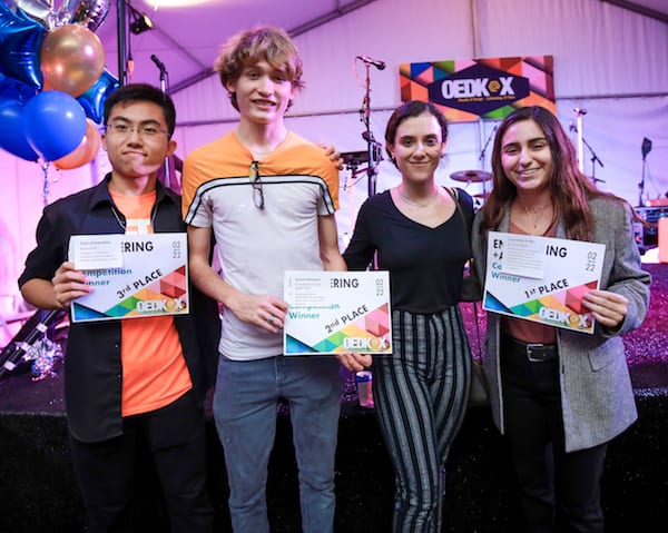 Winners of the OEDK engineering art competition, from left: Scout Kan for "Gears of Inspiration," third place; Braden Perryman and Maggie Webb for "Natural Reflections," second place, and Fernanda Lago for "Generating an Idea," first place. Photo by An Le