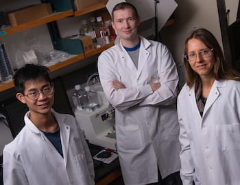 Rice University researchers (from left) Ryan Lee, Alexey Revtovich and Natasha Kirienko showed how a dietary deficit of vitamin B12 harms the health of nematodes at a cellular level, leading to an increased risk of infection by two potentially deadly pathogens. (Photo by Jeff Fitlow/Rice University)
