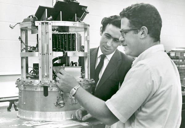 Professor Brian O'Brien, left, and Rice alumnus David Reasoner, by then a Rice space scientist himself, work on a space-bound probe in 1966. Photo courtesy of Fondren Library/Rice University