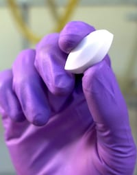 A pristine stir bar made of ferromagnetic metal with a PTFE, or Teflon, coating. Rice University chemists discovered the inert bars, which are commonly used to mix chemicals, cause unwanted results during Billups-Birch reactions with carbon and other nanotubes. (Credit: Photo by Brandon Martin/Rice University)