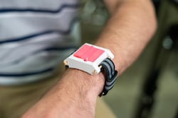 The goal of a team of Rice University students is to create a wearable epinephrine delivery device that people prone to allergic reactions can keep on them and handy at all times. Larger prototypes served as the proof-of-concept that a spring-loaded, trifold device can effectively deliver a full dose of epinephrine. (Credit: Brandon Martin/Rice University)