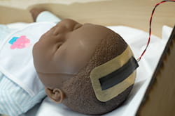 A system developed by Rice University engineering students is designed to monitor high intracranial pressure within the skulls of infants, a condition that affects more than 400,000 every year. (Credit: Jeff Fitlow/Rice University)