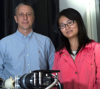 Researchers Tomasz Tkaczyk and Ye Wang, who earned her doctorate this year at Rice University, led the development of a portable spectrometer able to capture far more data much quicker than other fiber-based systems. The TuLIPSS camera will be useful for quick analysis of environmental and biological data. (Credit: Jeff Fitlow/Rice University)