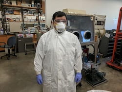 Varun Shenoy Gangoli, a research scientist at Rice University, models the proper attire for handling bulk nanomaterials for laboratory use. Gangoli and his colleagues developed a quick, clean and inexpensive method for transferring carbon nanotubes and offered it to other labs through a journal article. (Credit: Barron Research Group/Rice University)