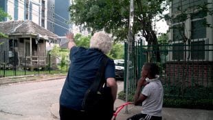 “I have never loved teaching like I love teaching now,” said Winningham, shown in the Fourth Ward during one of his photo strolls through Houston. (Photo by Brandon Martin)