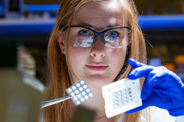 Rice University graduate student Madeline Monroe led a project to use layered filter paper to mimic aortic heart valves. The technique allows researchers to study in detail how calcifying diseases slow or stop hearts from functioning. (Credit: Jeff Fitlow/Rice University)