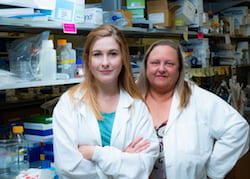 Rice University graduate student Madeline Monroe, left, and bioengineer Jane Grande-Allen led a project to use layered filter paper to mimic aortic heart valves. The technique revealed that a natural collagen appears to have a strong association with calcification when it is found outside its usual domain. (Credit: Jeff Fitlow/Rice University)