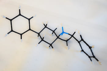 A model shows an exposed blue nitrogen in a four-member ring, the active part of an azetidine molecule. Rice University scientists synthesized the molecule to simplify the process of drug design. (Credit: Jeff Fitlow/Rice University)