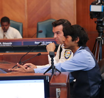 Ashwin Varma, right, makes his case before the Houston City Council's Public Safety Committee on Aug. 13. With him at left is Assistant Fire Chief Ruy Lozano. Photo by Donald Soward