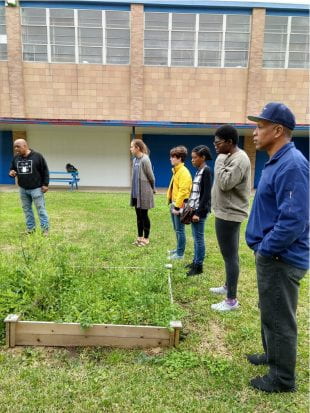 The team visited Attucks Middle School to observe how the students are taught to use aquaponics to grow plants. This system became the model for the Sunnyside Energy Project's Aquaponics Hub.