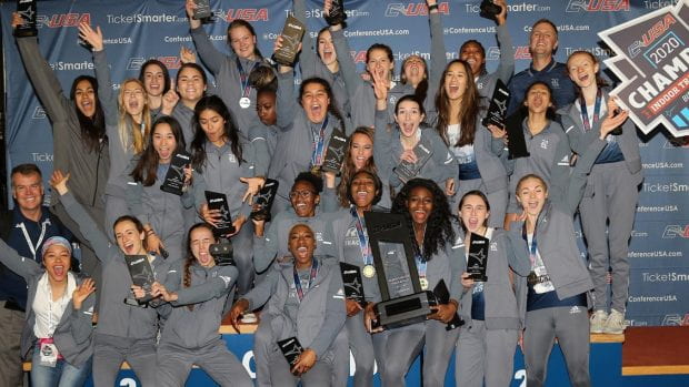 The Rice women's track and field team celebrates after claiming the Conference USA indoor championship Feb. 23 in Birmingham, Ala. (Conference USA photo)