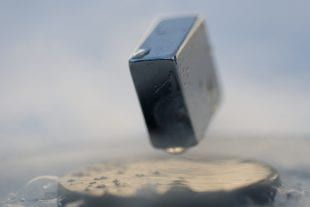 A magnet levitating atop an unconventional superconductor