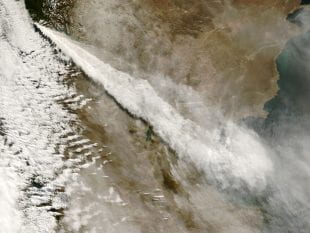 A NASA satellite image of a volcanic plume from Chile's Mount Chaitén rising over the Andes Mountains and drifting across Argentina on this May 3, 2008.