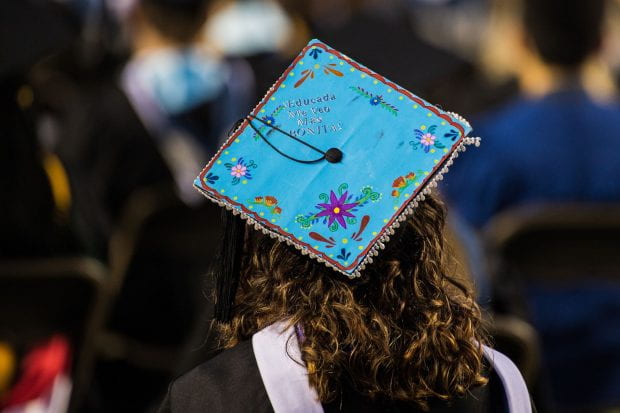 A Class of 2020 grad wears a decorated mortarboard.