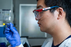 Rice graduate student Dongyang Zhu holds an aerogel made through a simple chemical process and intended for environmental remediation or as membranes for batteries and other applications. (Credit: Jeff Fitlow/Rice University)