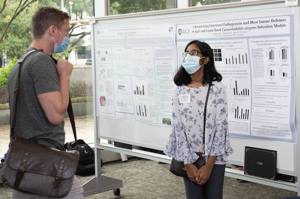Vyshnavi Gade presents her winning poster at the IBB Summer Undergraduate Research Symposium. Photo by Jeff Fitlow