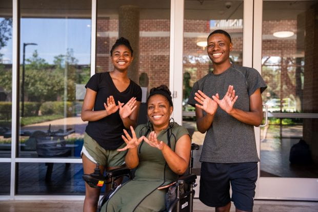 Jones College freshman Jerron-Michael Arline poses with his family. (Photo by Brandon Martin)